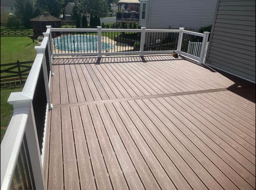 Large composite deck overlooking pool