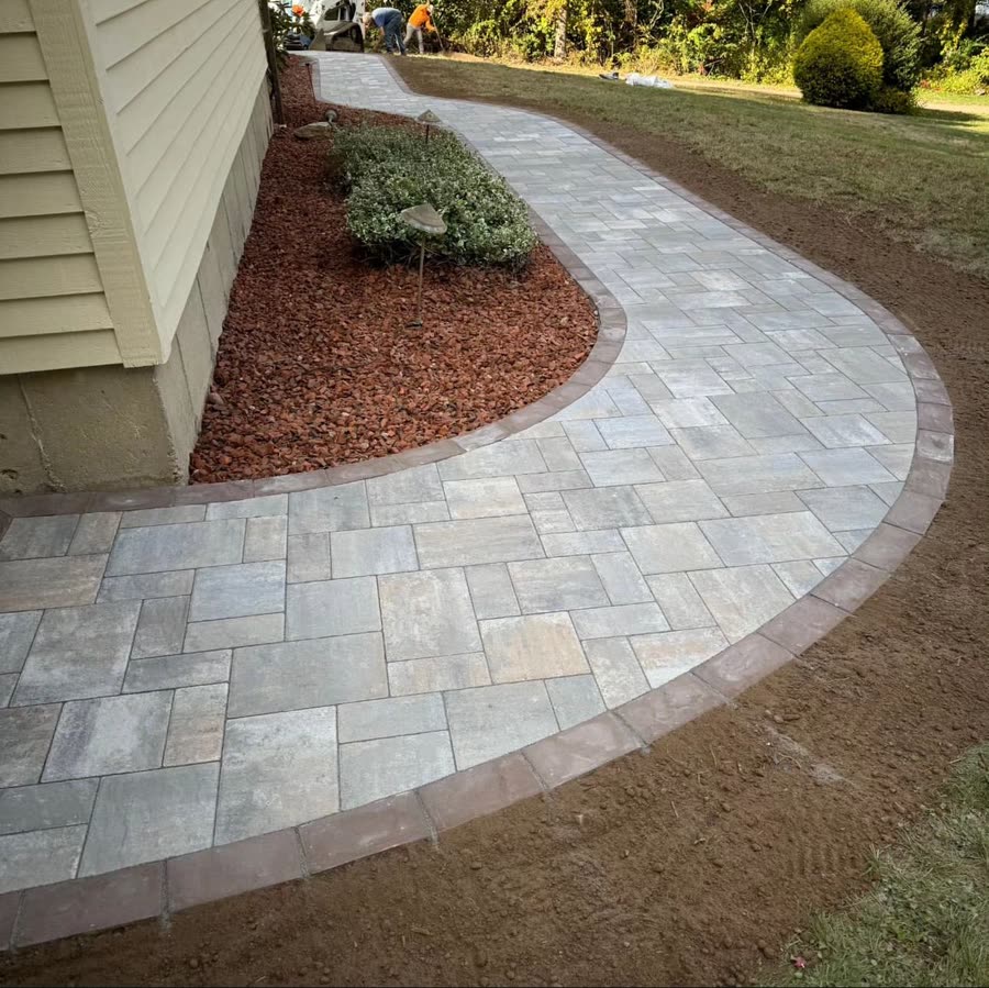 Custom paver walkway with landscaping